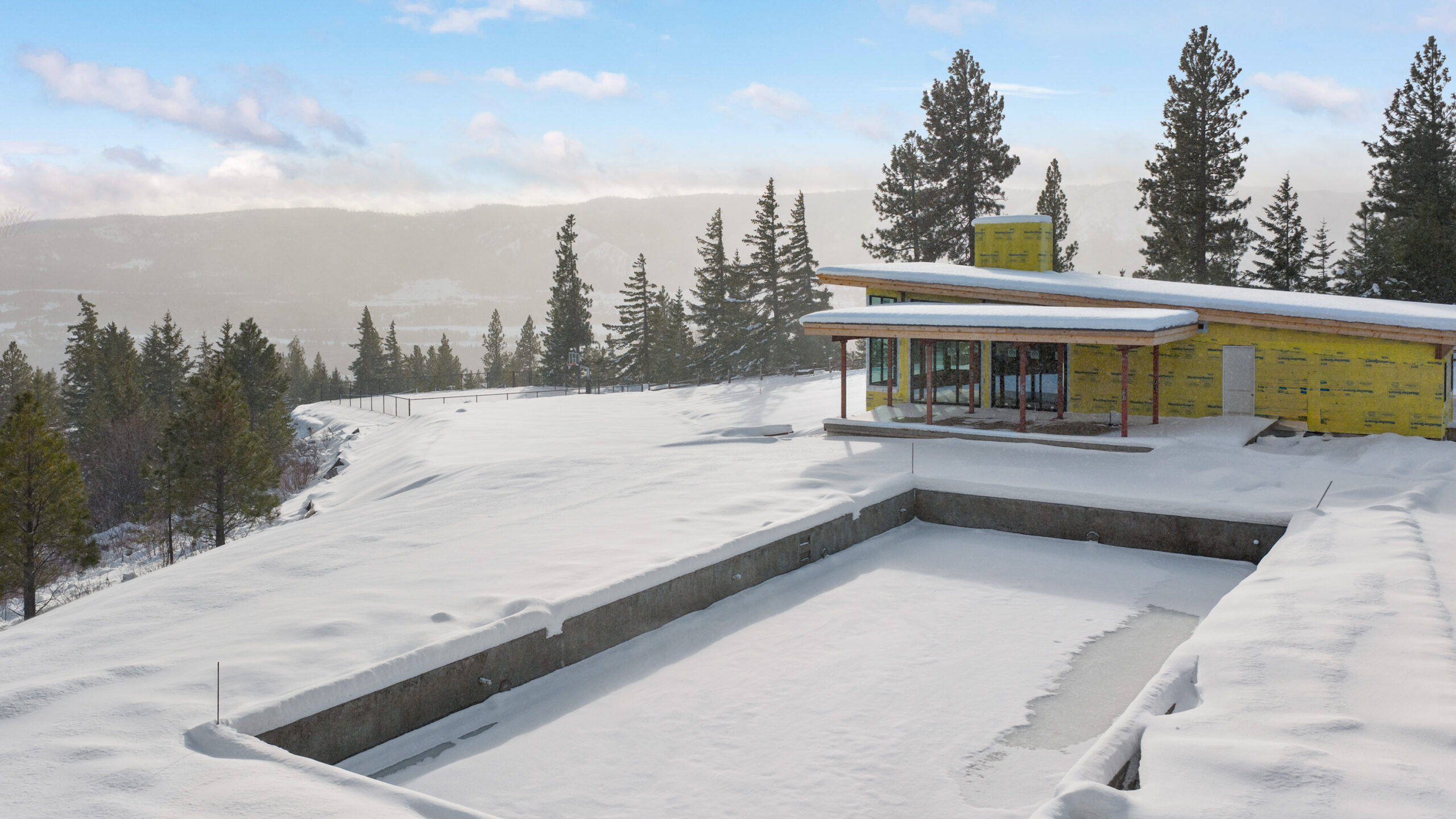 The SLR Lodge and Pool in Snow The Lodge at Skyline Ridge under construction and blanketed in snow